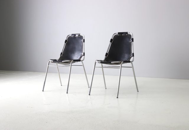Black leather Les Arcs dining chairs selected by Charlotte Perriand for the Les Arcs ski resort in France 1960s 1970s 1