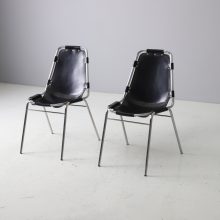 Black leather Les Arcs dining chairs selected by Charlotte Perriand for the Les Arcs ski resort in France 1960s 1970s 2