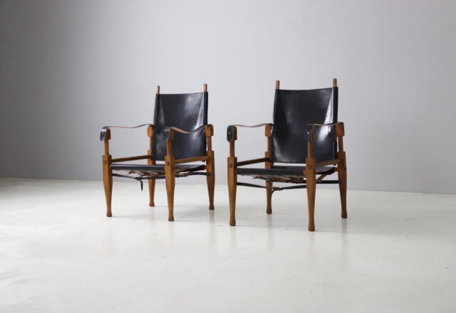 Pair of Wilhelm Kienzle vintage safari chairs in black leather for Wohnbedarf Switzerland, 1950s 1