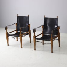 Pair of Wilhelm Kienzle vintage safari chairs in black leather for Wohnbedarf Switzerland, 1950s 2