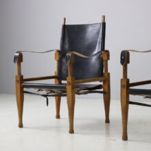 Pair of Wilhelm Kienzle vintage safari chairs in black leather for Wohnbedarf Switzerland, 1950s 3
