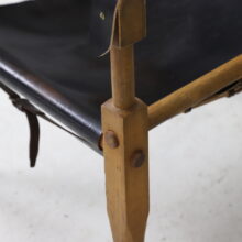 Pair of Wilhelm Kienzle vintage safari chairs in black leather for Wohnbedarf Switzerland, 1950s 4