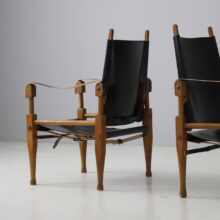 Pair of Wilhelm Kienzle vintage safari chairs in black leather for Wohnbedarf Switzerland, 1950s 6